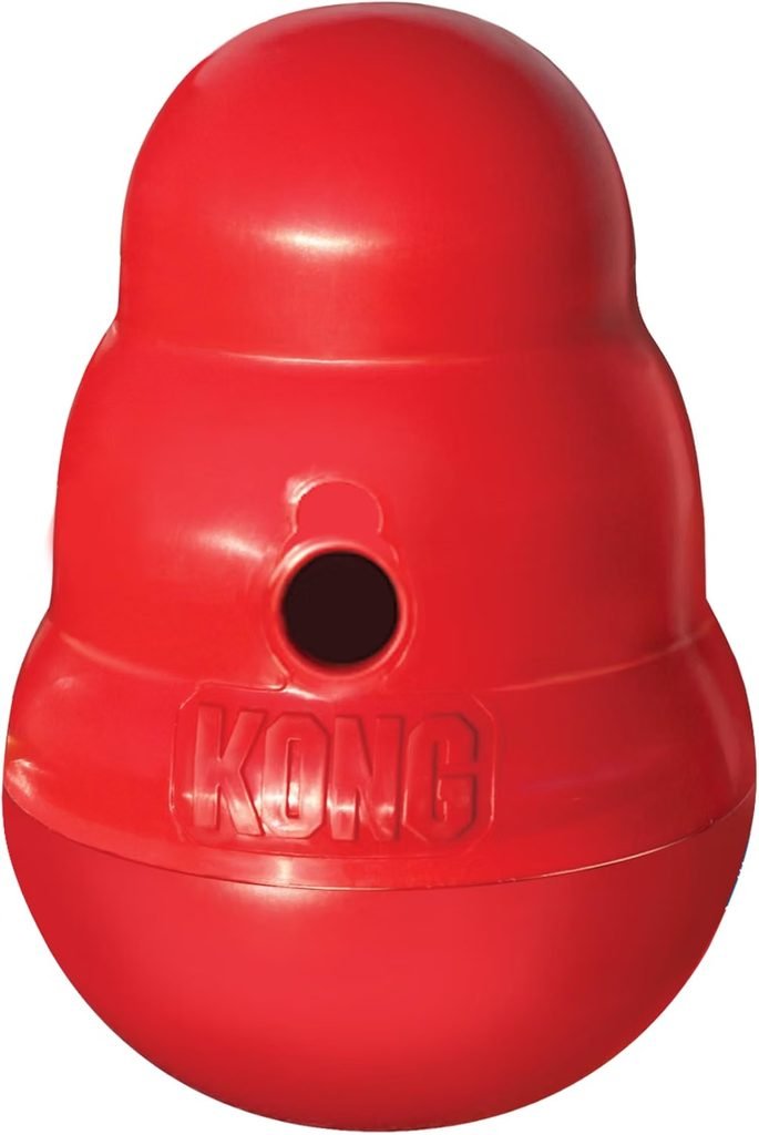 KONG Wobbler Treat Dispensing Dog Toy for dogs left home alone